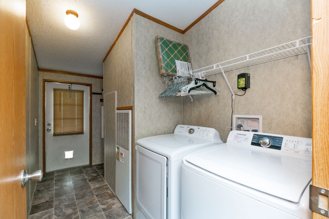 399 Calvert Ridge Road Westmoreland, TN 37186 - Photo 22 of 31 a utility room with dryer and washer