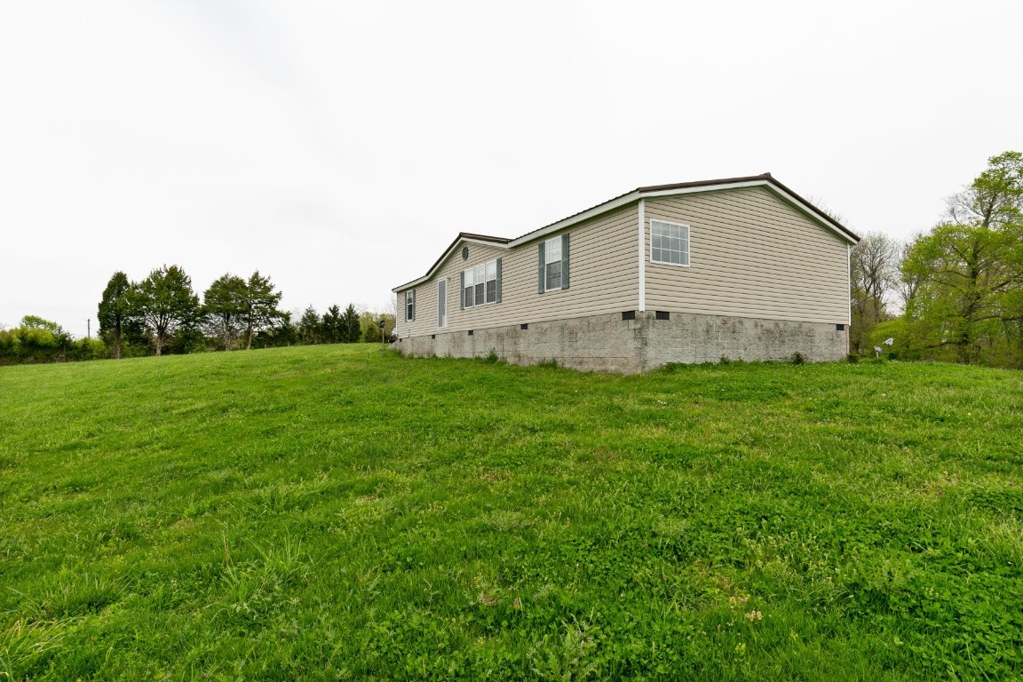 399 Calvert Ridge Road Westmoreland, TN 37186 - Photo 23 of 31 a house view with a outdoor space