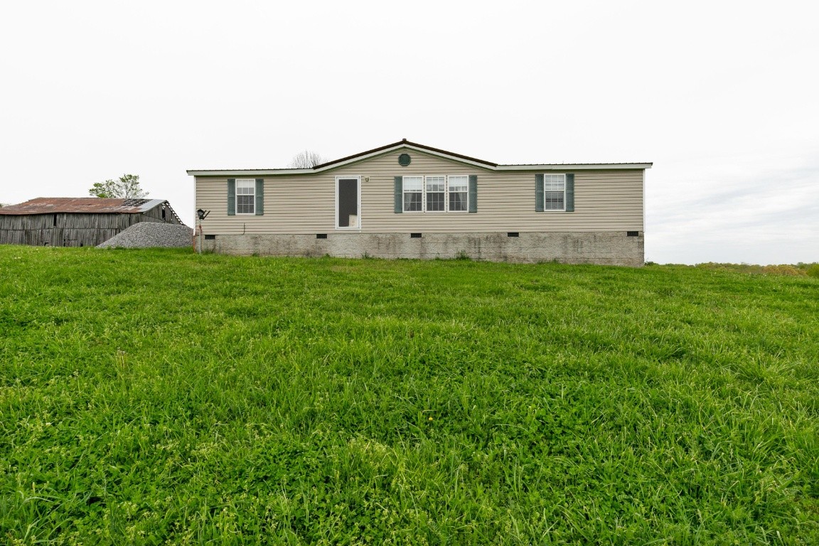 399 Calvert Ridge Road Westmoreland, TN 37186 - Photo 24 of 31 a house view with a backyard space