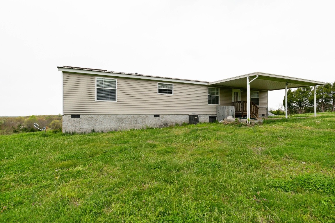 399 Calvert Ridge Road Westmoreland, TN 37186 - Photo 31 of 31 a house view with a garden space