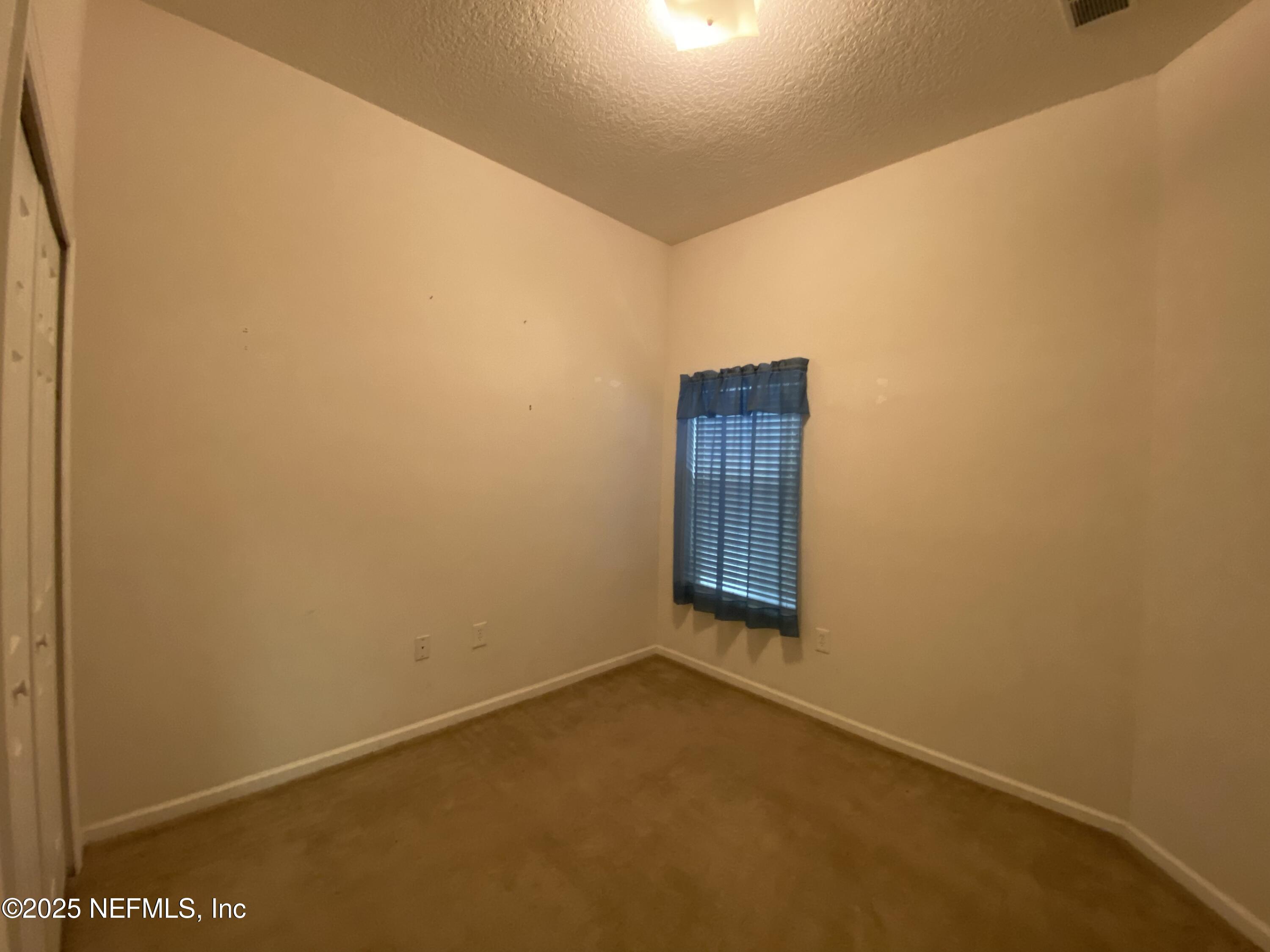7920 Merrill Road, Unit 405 Jacksonville, FL 32277 - Photo 8 of 12 IMG_5132