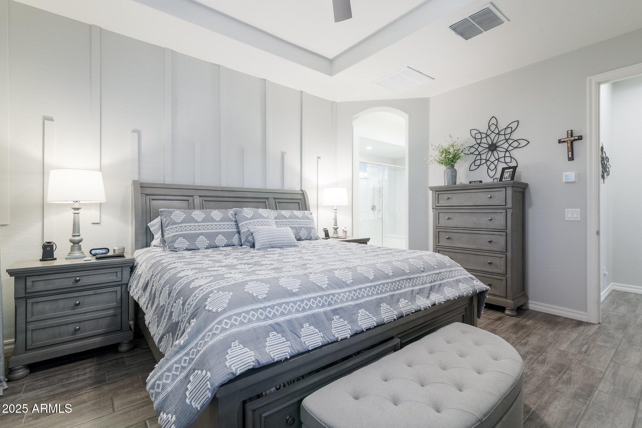 3437 East Appaloosa Road Gilbert, AZ 85296 - Photo 2 of 47 a bedroom with a bed and a dresser
