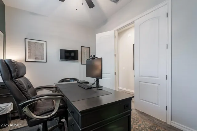 a workspace with furniture and lamp