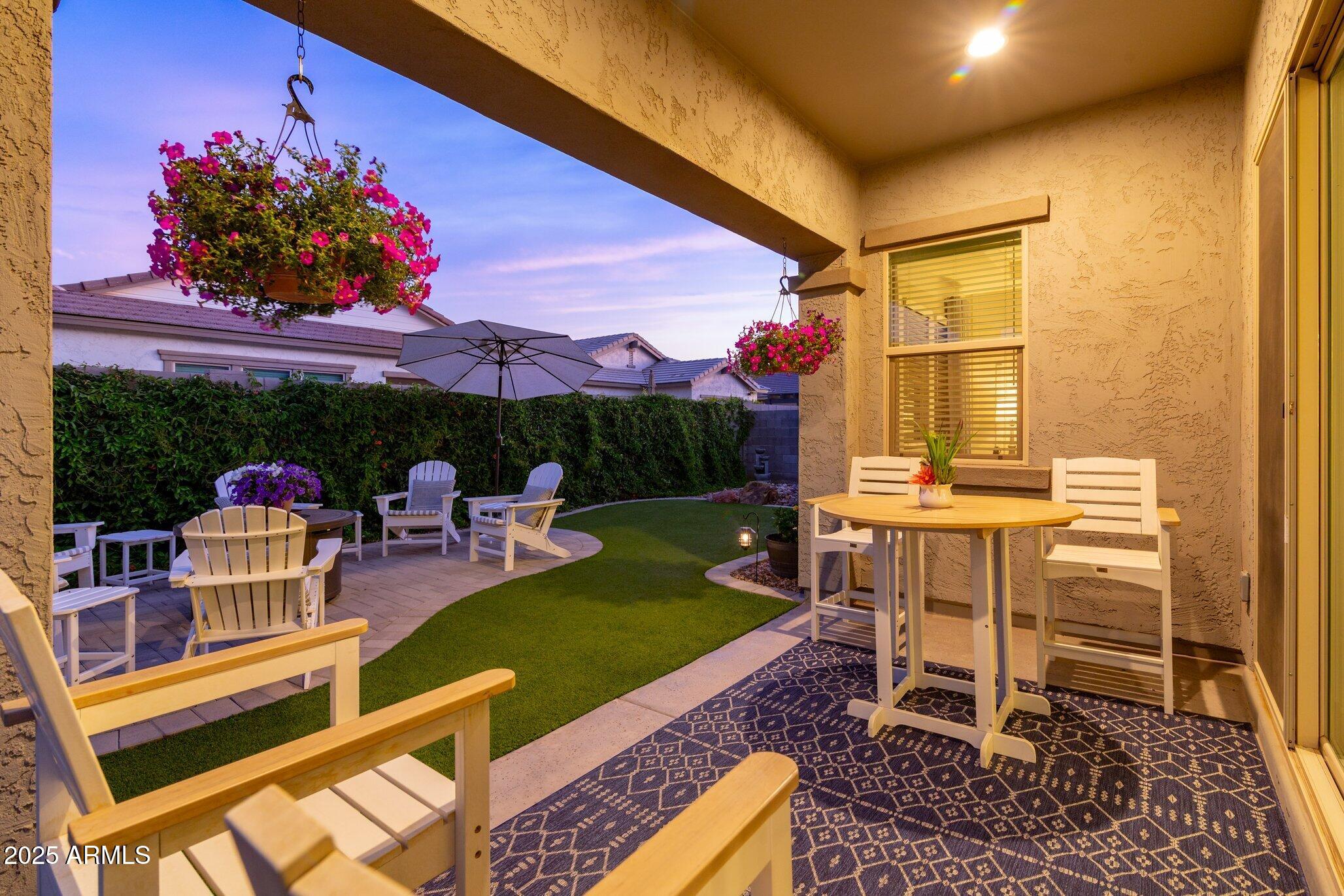 3437 East Appaloosa Road Gilbert, AZ 85296 - Photo 4 of 47 a view of a backyard with sitting area
