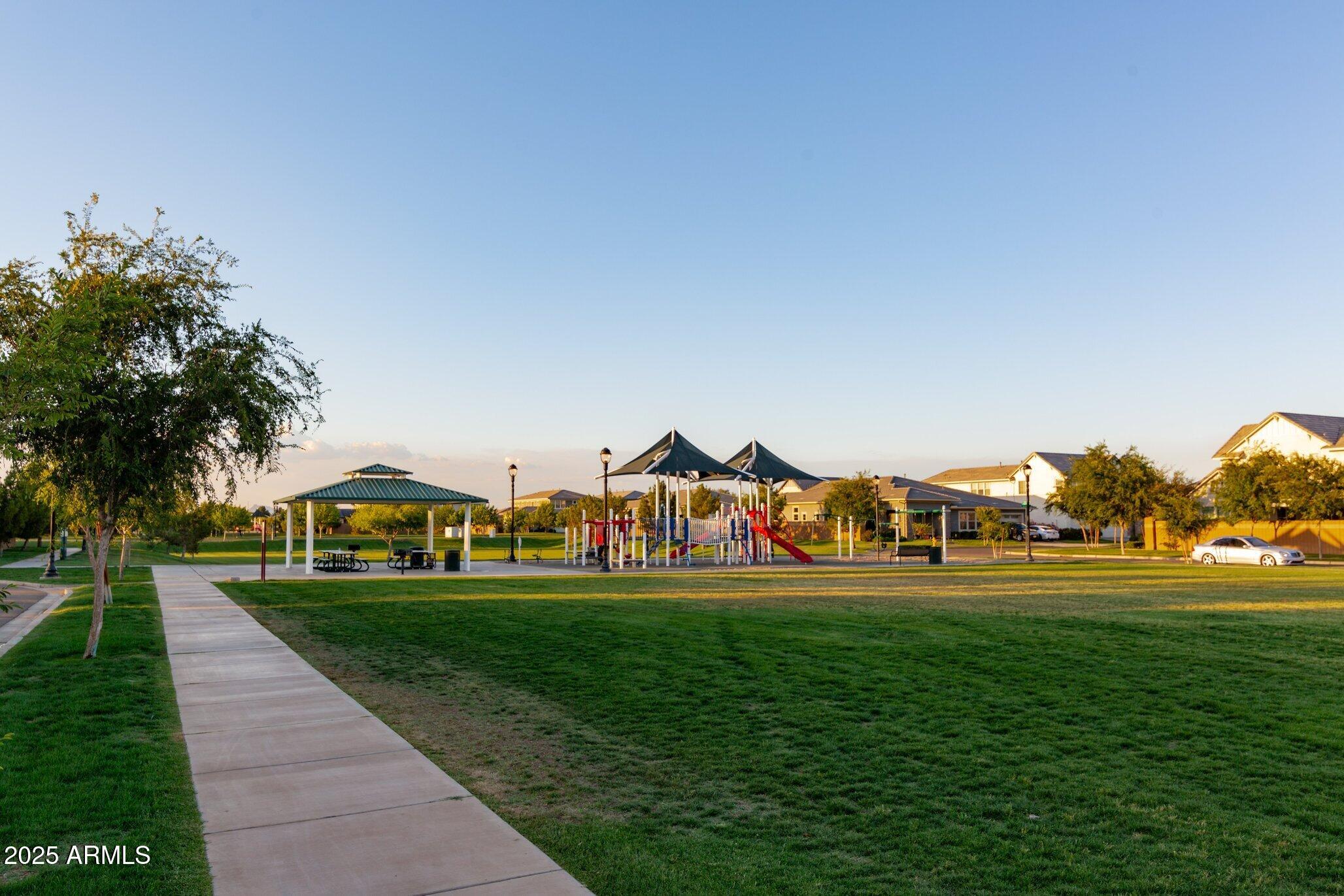 3437 East Appaloosa Road Gilbert, AZ 85296 - Photo 41 of 47 a childrens park with swings and slides
