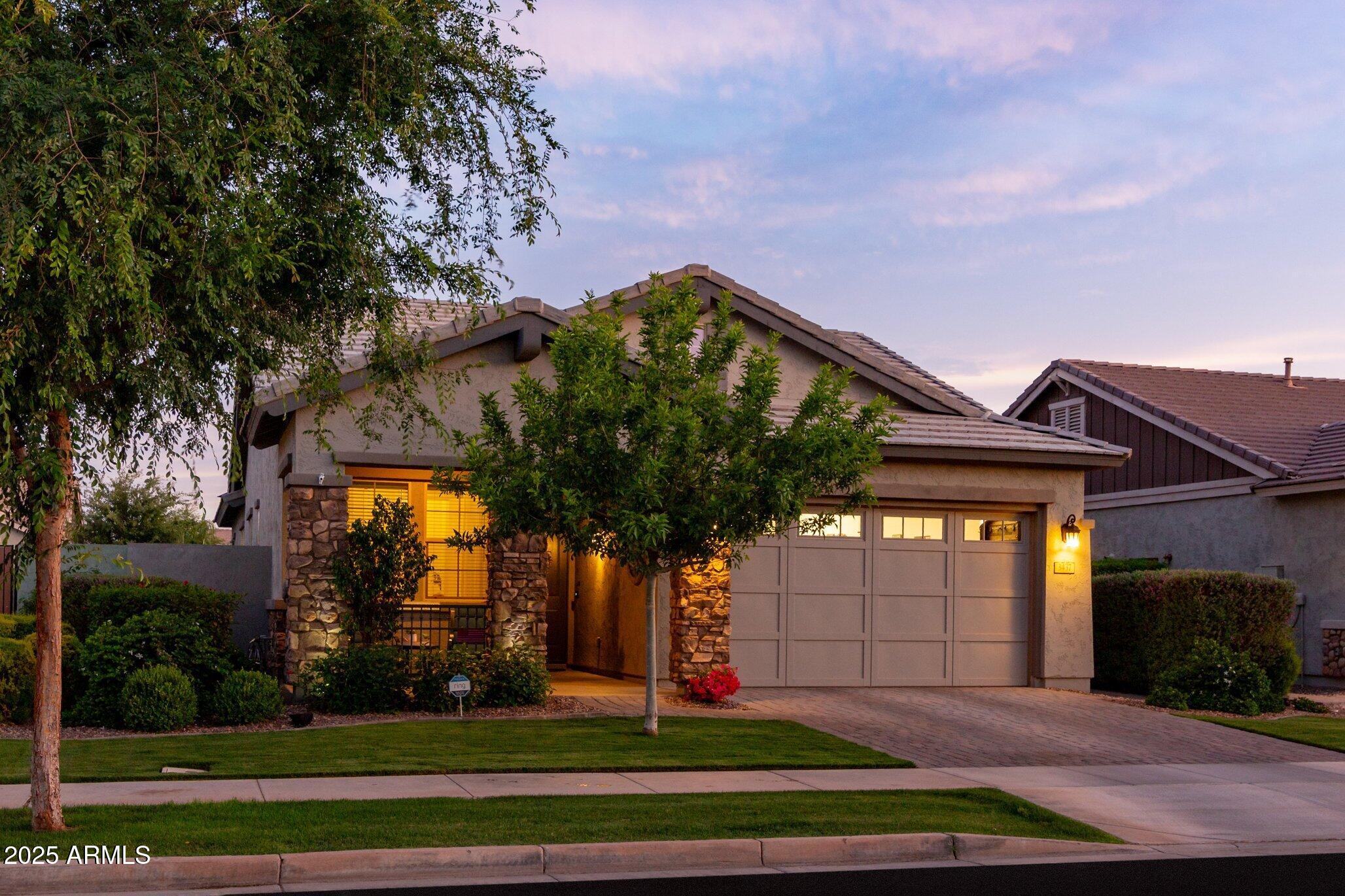 3437 East Appaloosa Road Gilbert, AZ 85296 - Photo 47 of 47 a front view of a house with a yard