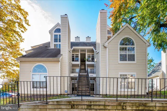 a front view of a house with a garage