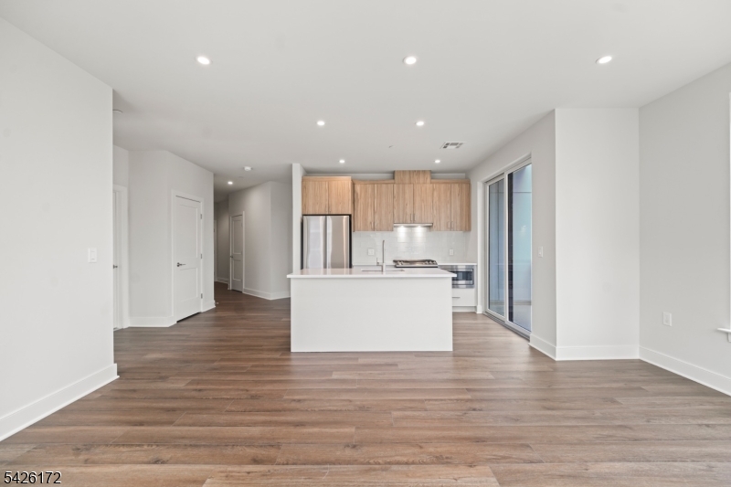 434 Springfield Avenue, Unit 146 Berkeley Heights, NJ 07922 - Photo 24 of 32 a view of kitchen with wooden floor