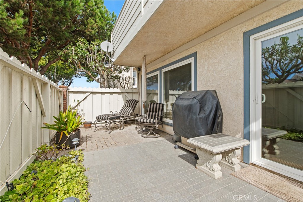 33623 Avenida Capri, Unit 60 Dana Point, CA 92629 - Photo 20 of 38 a building outdoor space with patio furniture