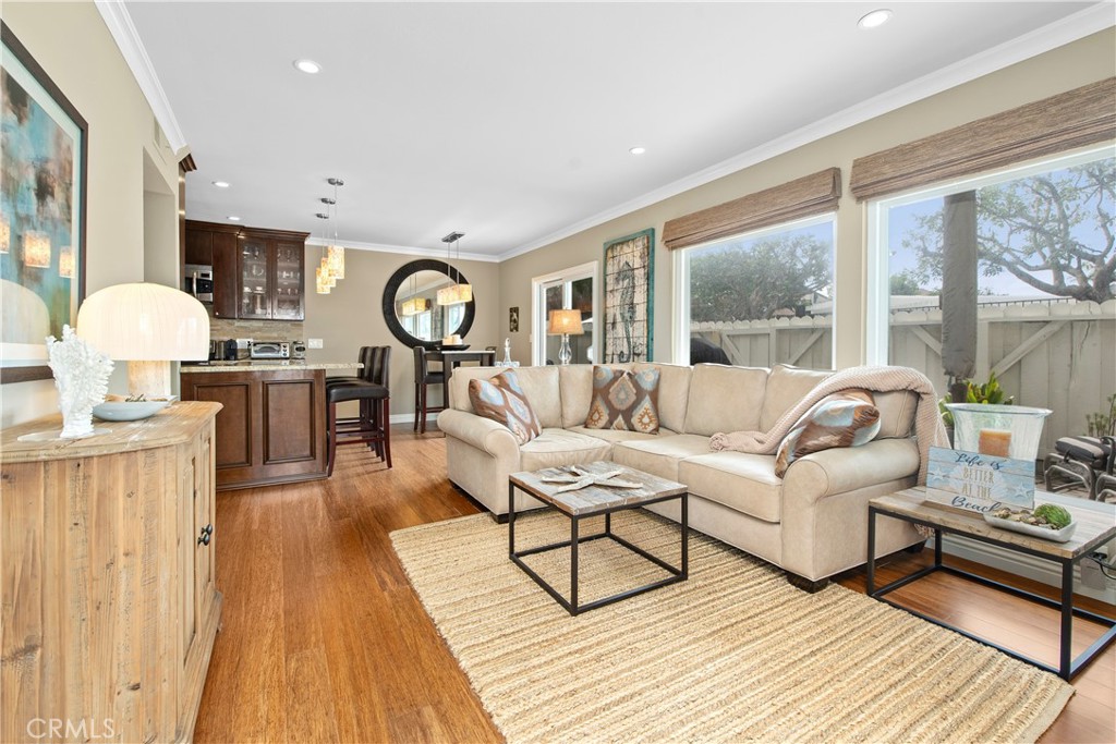 33623 Avenida Capri, Unit 60 Dana Point, CA 92629 - Photo 3 of 38 a living room with furniture and a wooden floor
