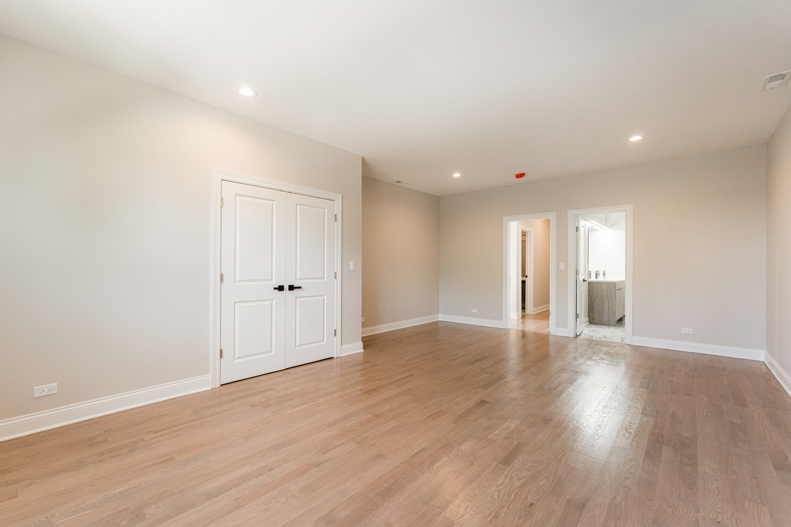 8121 W Forest Chicago, IL 60634 - Photo 18 of 44 a view of an empty room with wooden floor