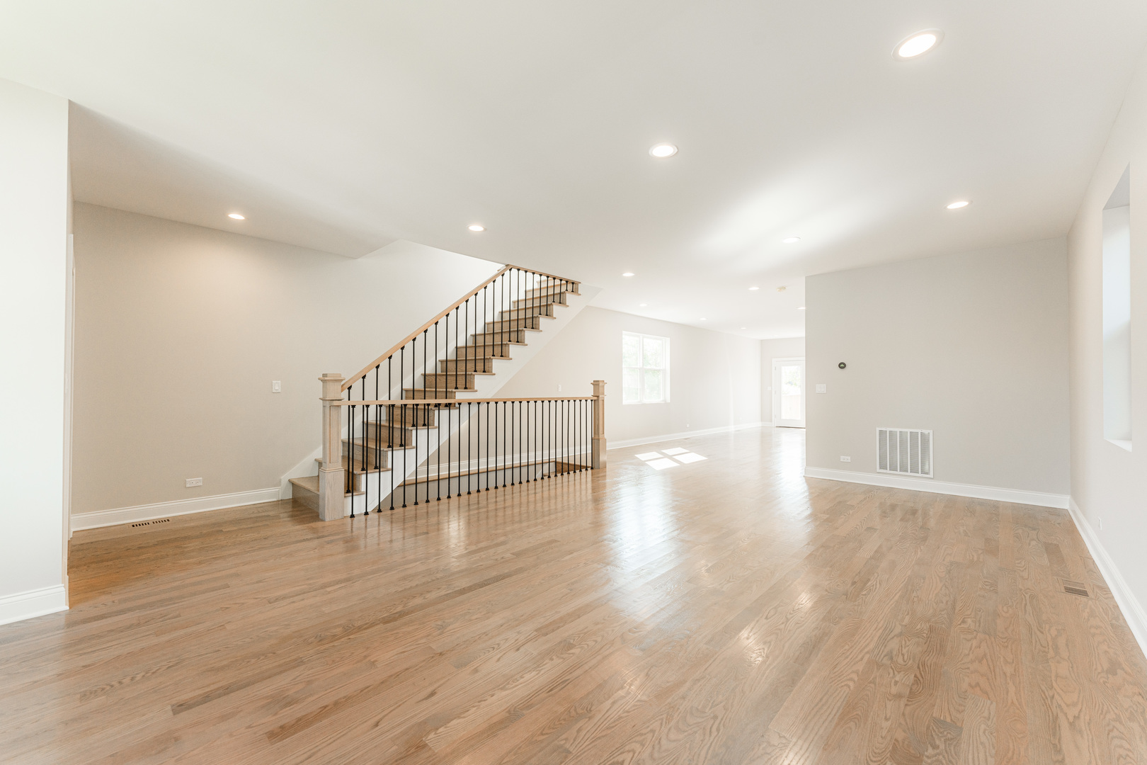 8121 W Forest Chicago, IL 60634 - Photo 3 of 44 a view of a hallway with wooden floor