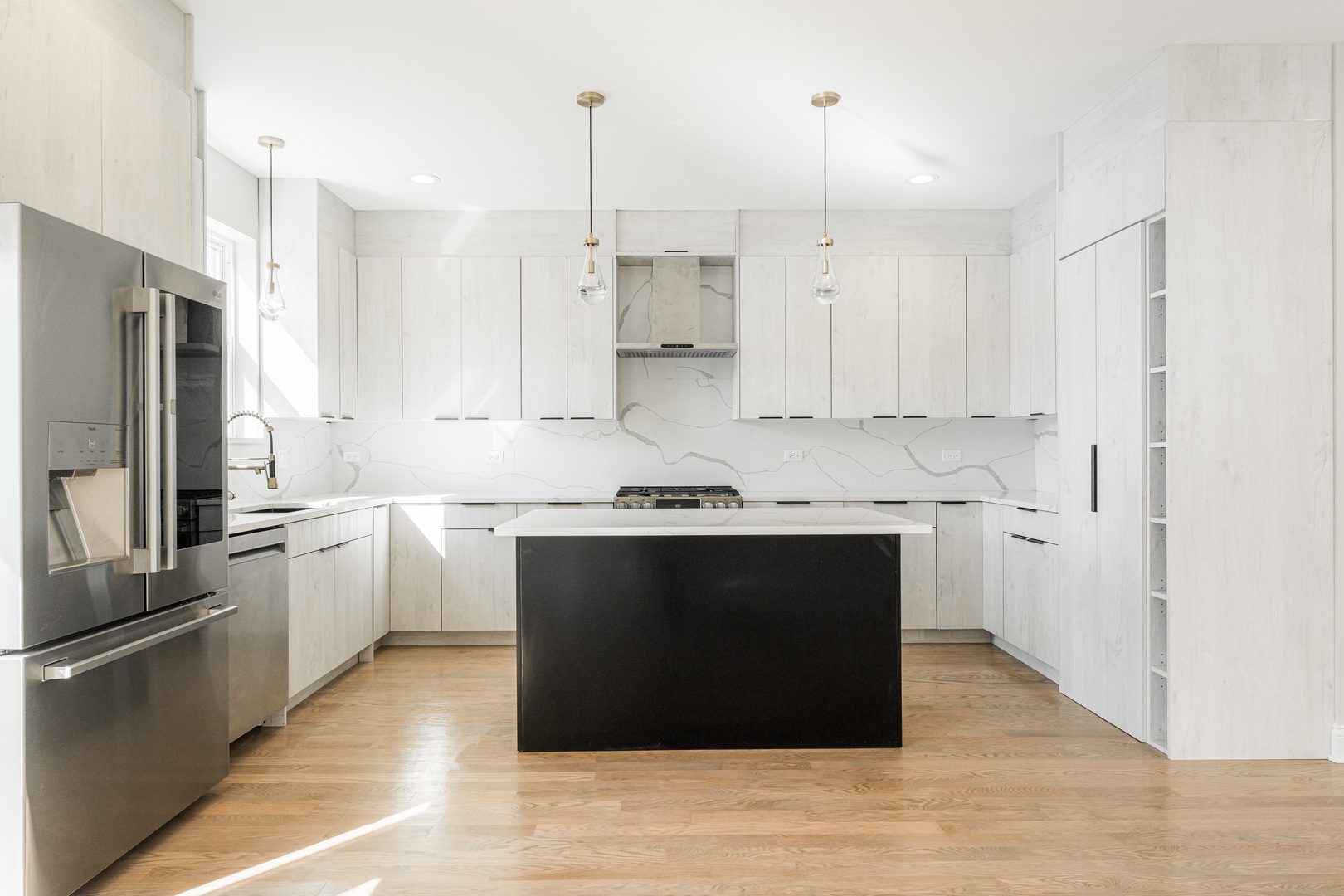 8121 W Forest Chicago, IL 60634 - Photo 9 of 44 a kitchen with stainless steel appliances granite countertop a refrigerator a sink and a stove