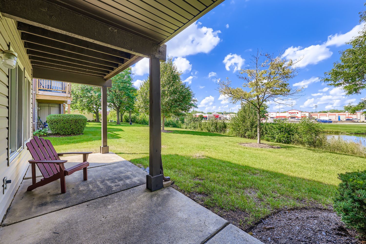 7526 Bristol Lane, Unit 2 Hanover Park, IL 60133 - Photo 20 of 21 a garden view with a seating space