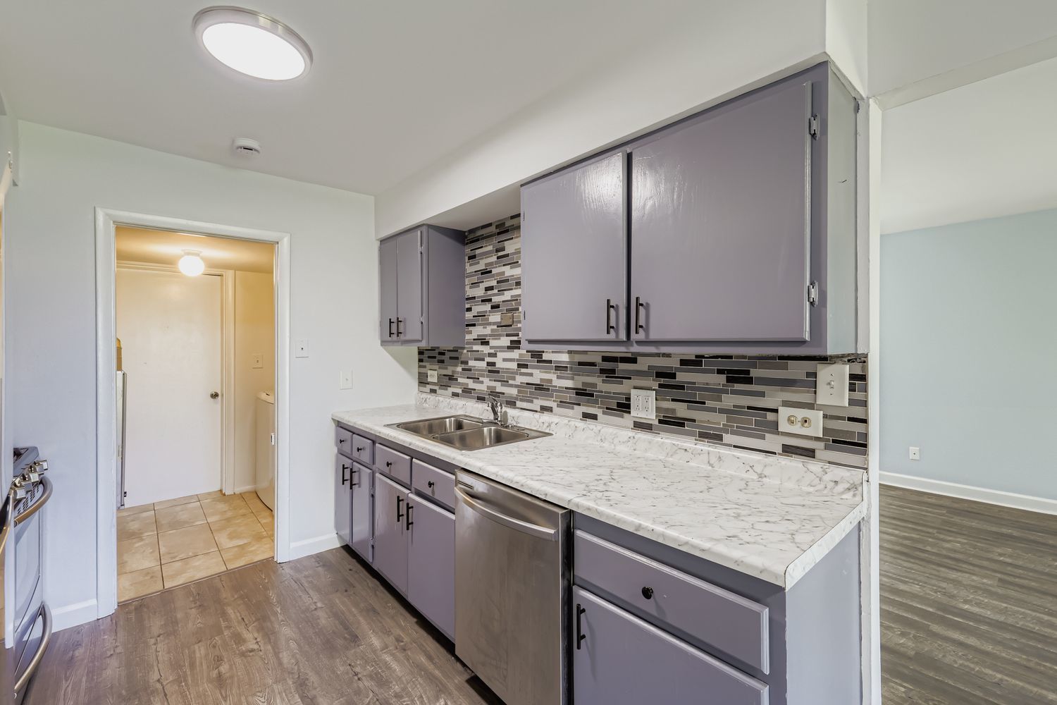 7526 Bristol Lane, Unit 2 Hanover Park, IL 60133 - Photo 8 of 21 a bathroom with a sink and a mirror