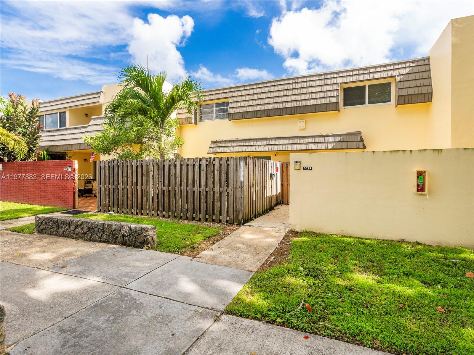 a view of a backyard with a garden
