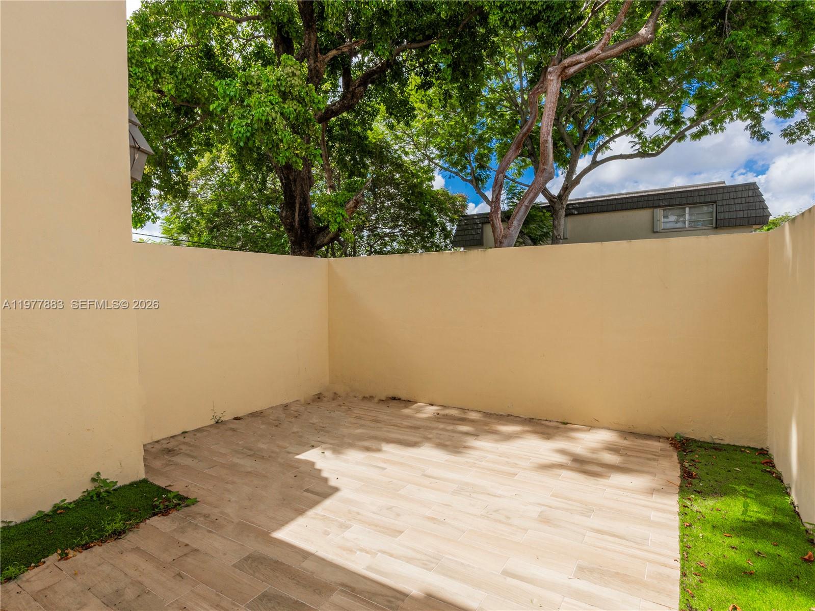 8329 Southwest 137th Avenue, Unit 8329 Miami, FL 33183 - Photo 3 of 33 a view of a yard with trees