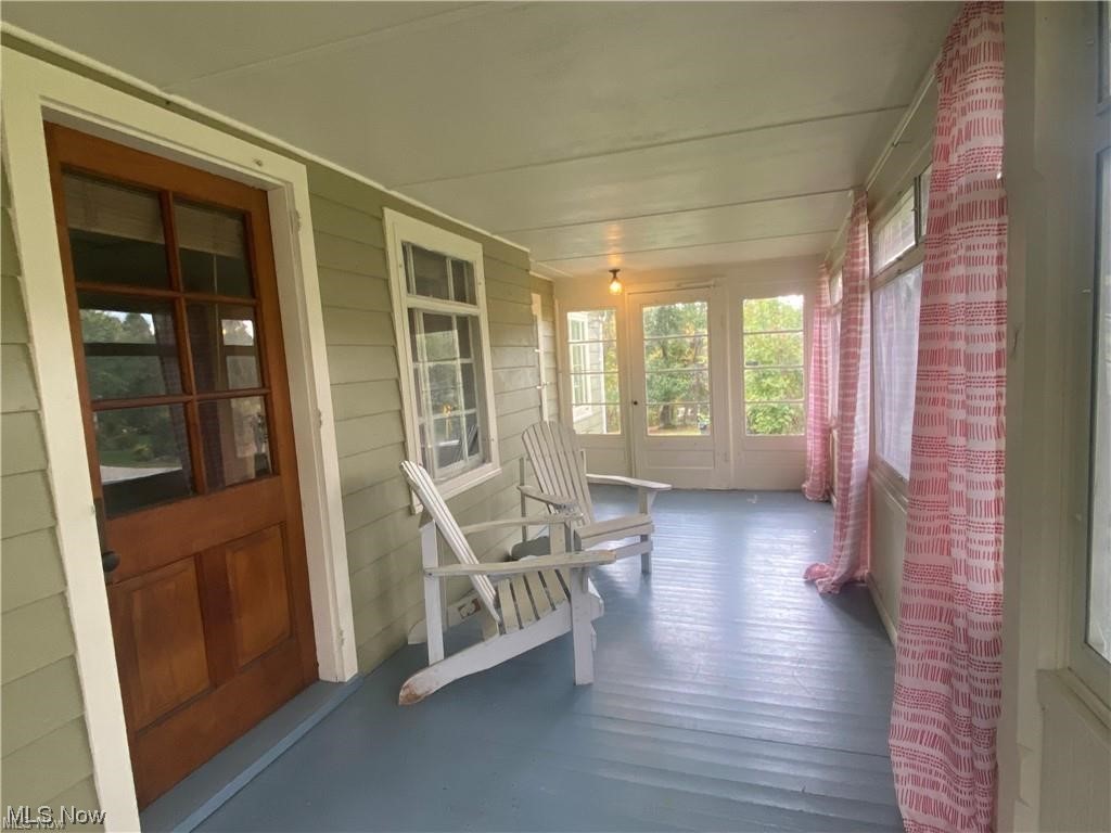56 North Hametown Road Akron, OH 44321 - Photo 9 of 41 View of sunny enclosed front porch