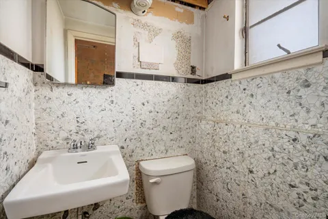 a bathroom with a sink and a toilet