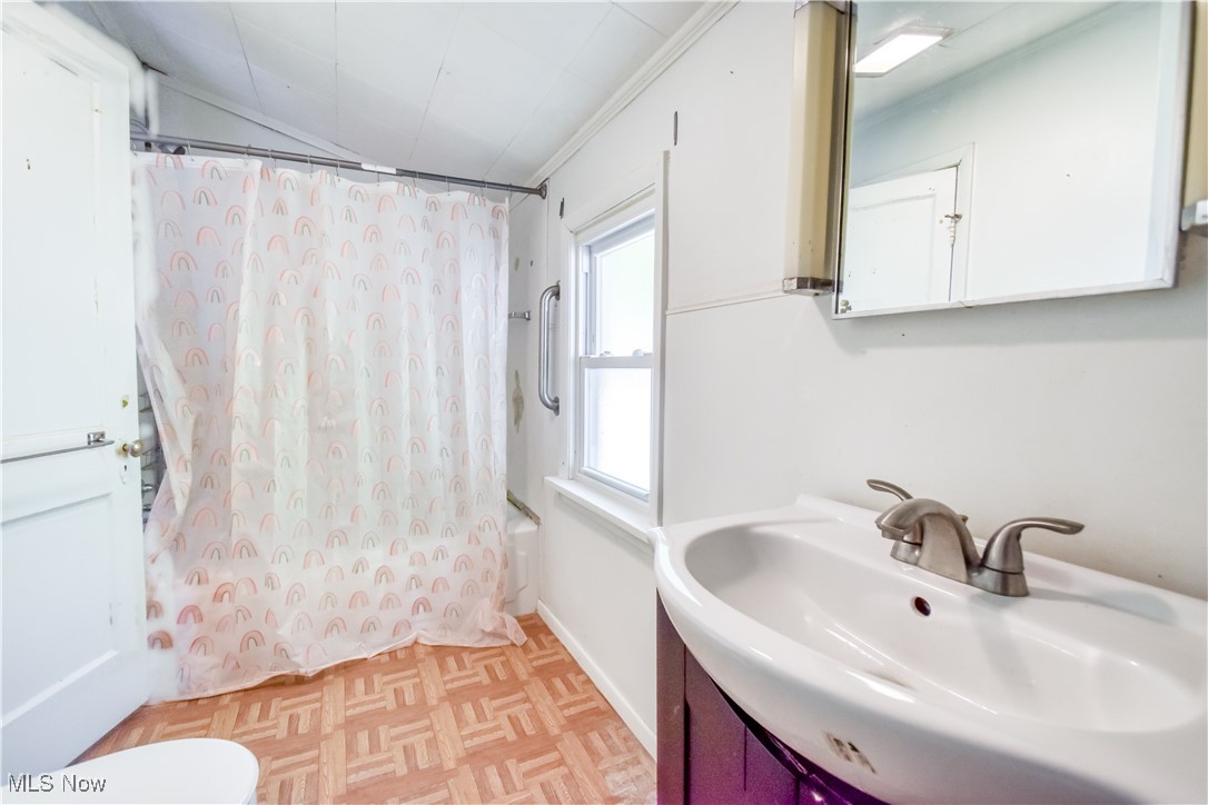 7665 Miami Road Mentor, OH 44060 - Photo 15 of 20 Full bathroom featuring shower / tub combo and vanity