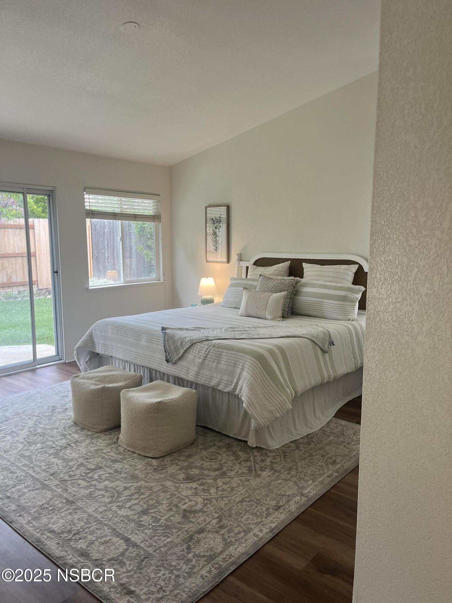 227 Valley Dairy Road Buellton, CA 93427 - Photo 6 of 10 a bedroom with a bed and a couch