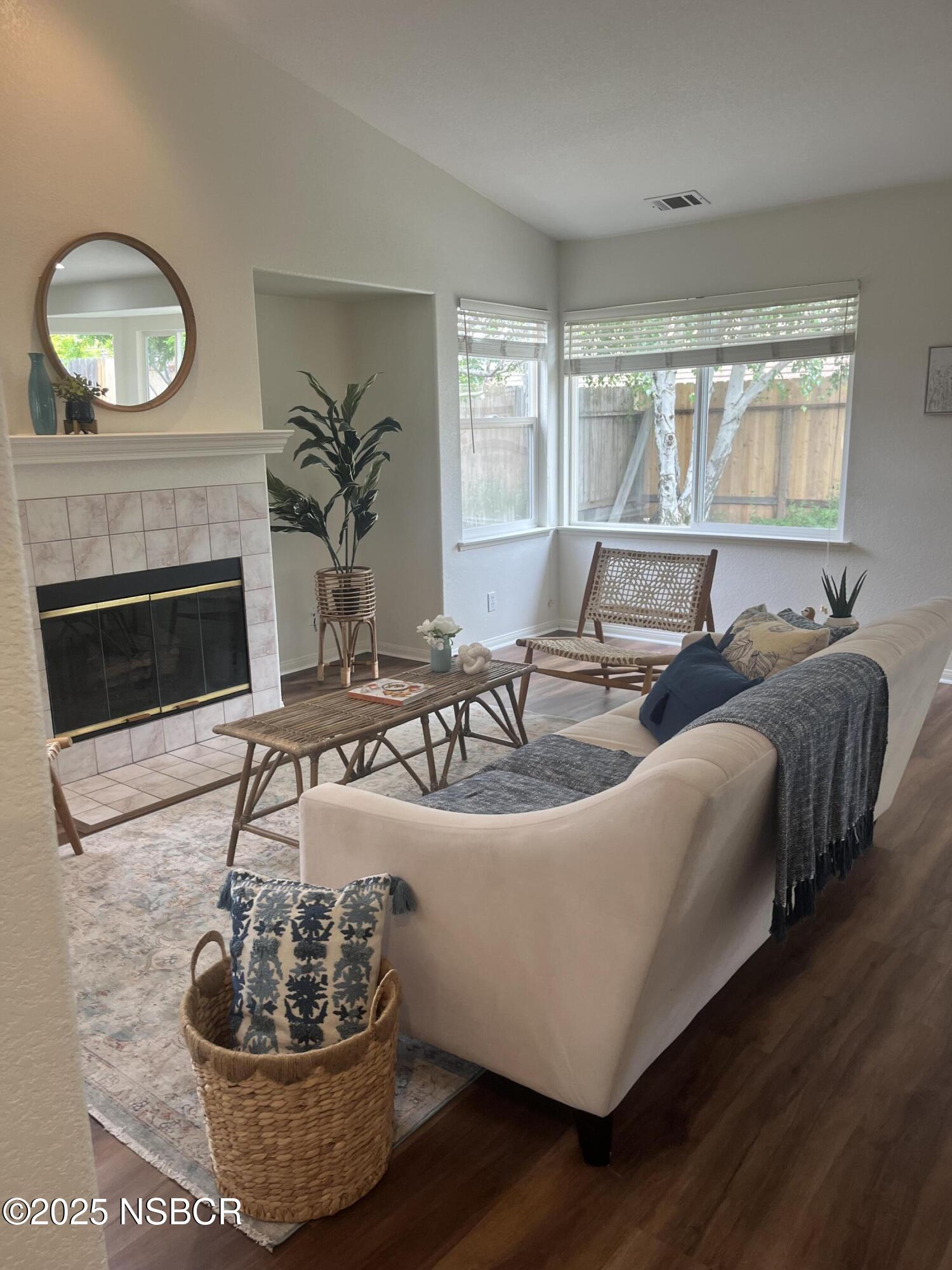 227 Valley Dairy Road Buellton, CA 93427 - Photo 9 of 10 a living room with furniture and a fireplace
