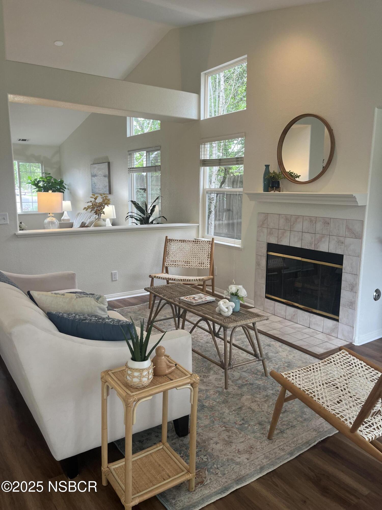 227 Valley Dairy Road Buellton, CA 93427 - Photo 10 of 10 a living room with furniture a window and a fireplace