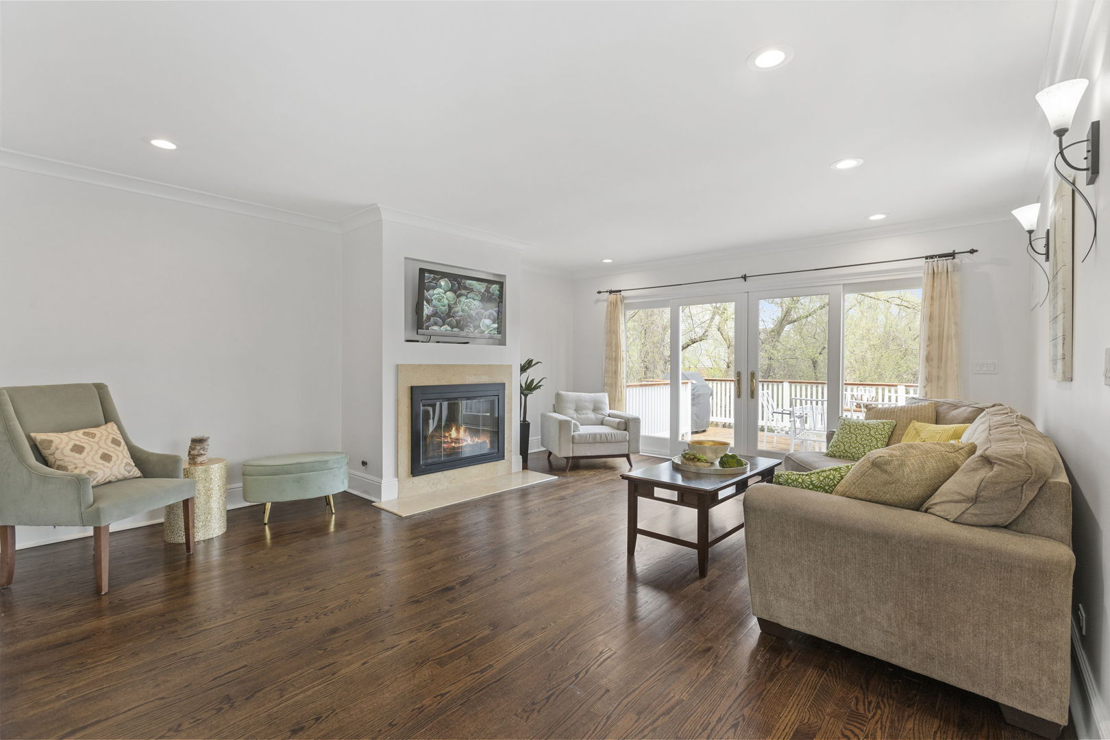 91 Wagner Road Northfield, IL 60093 - Photo 11 of 32 a living room with fireplace furniture and a large window