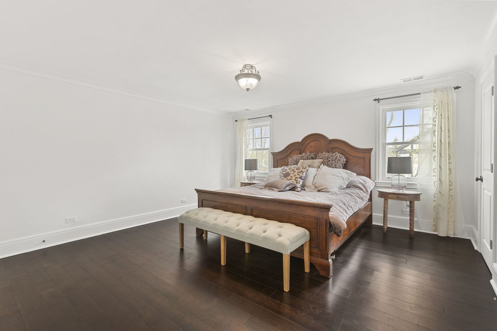 91 Wagner Road Northfield, IL 60093 - Photo 16 of 32 a bedroom with a bed and a table