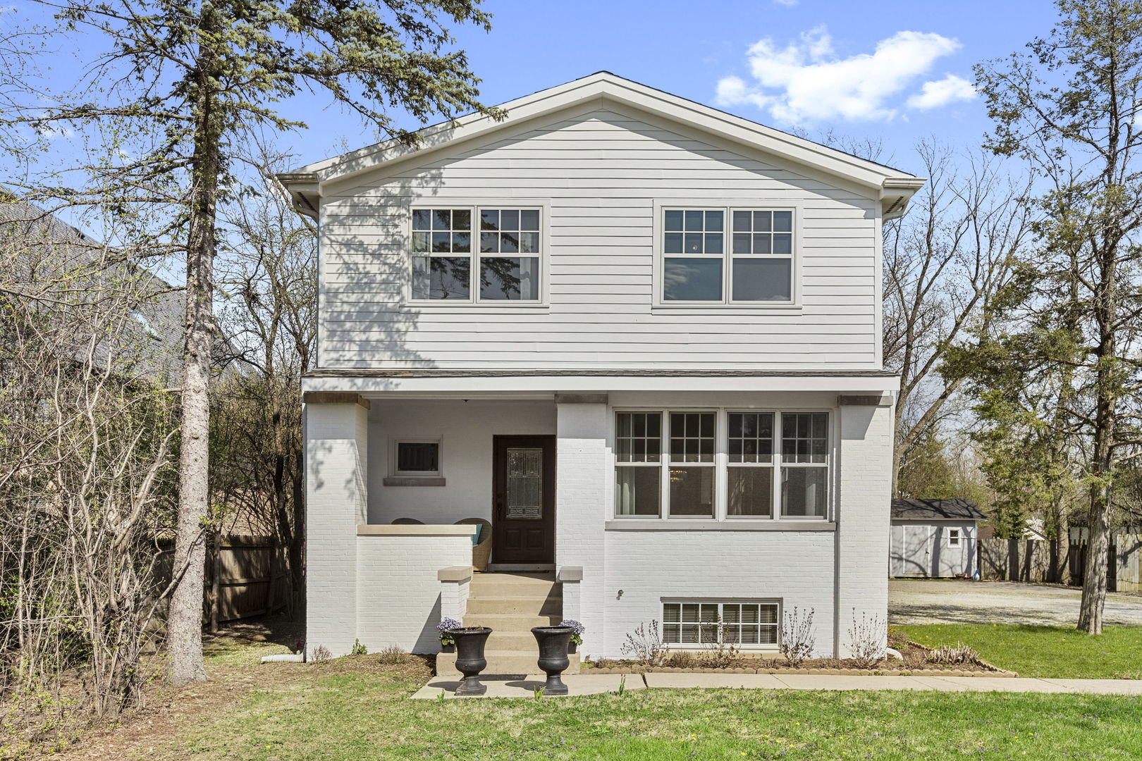 91 Wagner Road Northfield, IL 60093 - Photo 2 of 32 a front view of a house with a yard