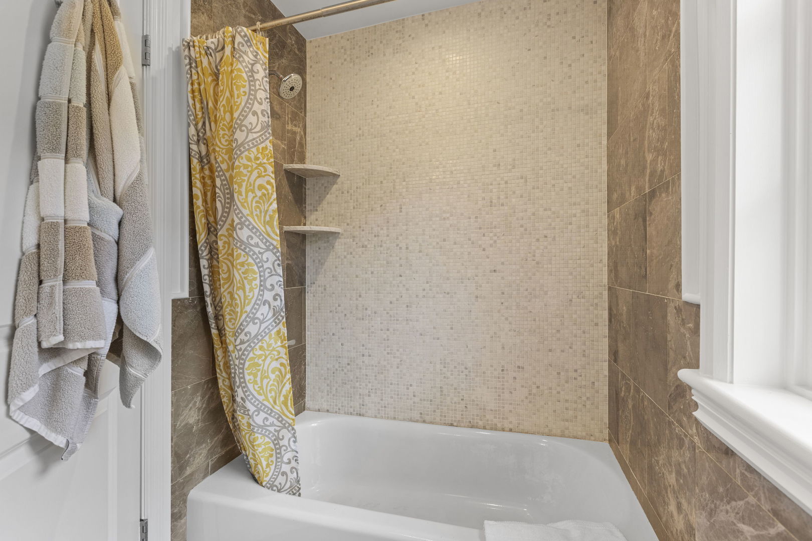 91 Wagner Road Northfield, IL 60093 - Photo 25 of 32 a bathroom with a bathtub and shower