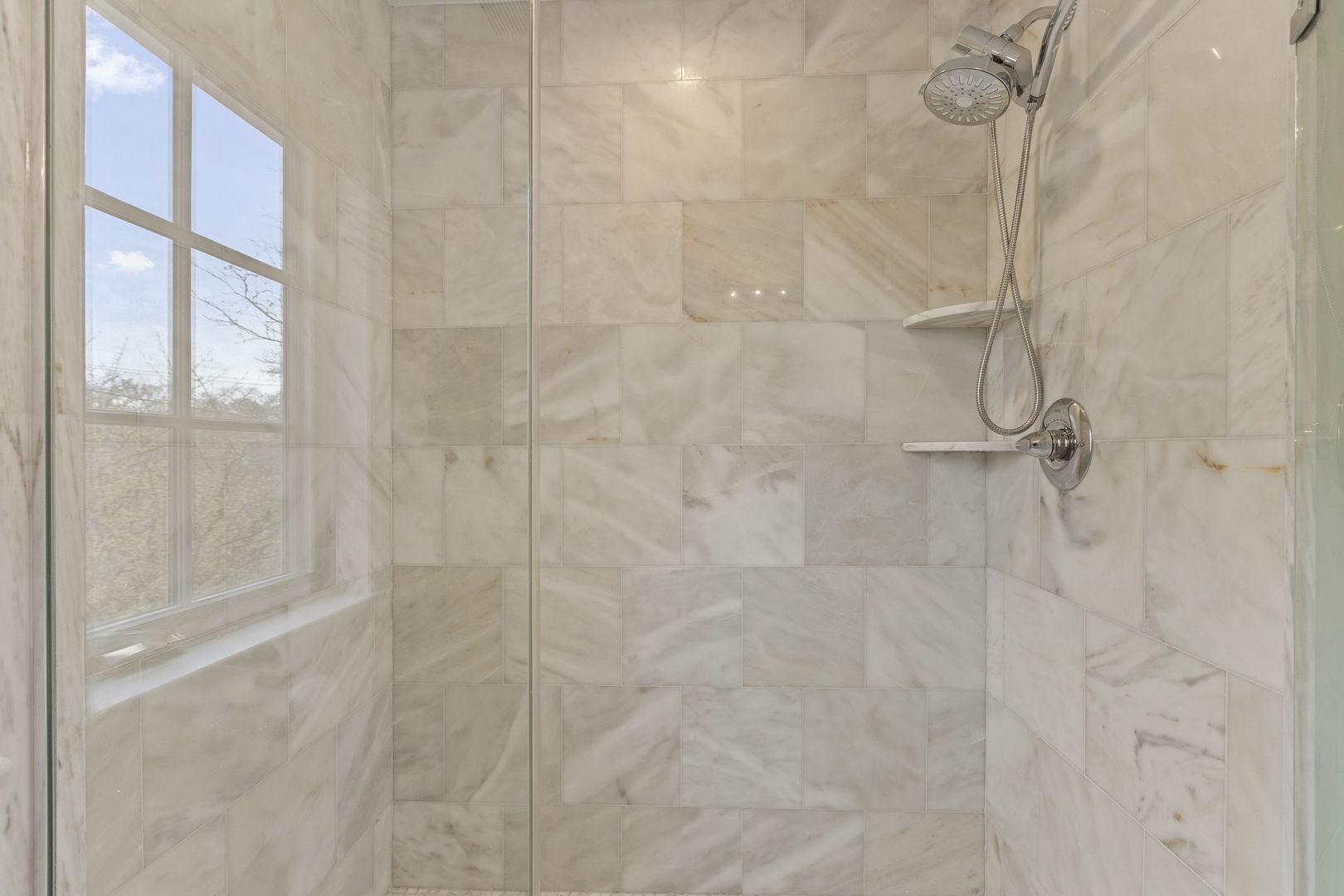 91 Wagner Road Northfield, IL 60093 - Photo 27 of 32 a bathroom with a shower