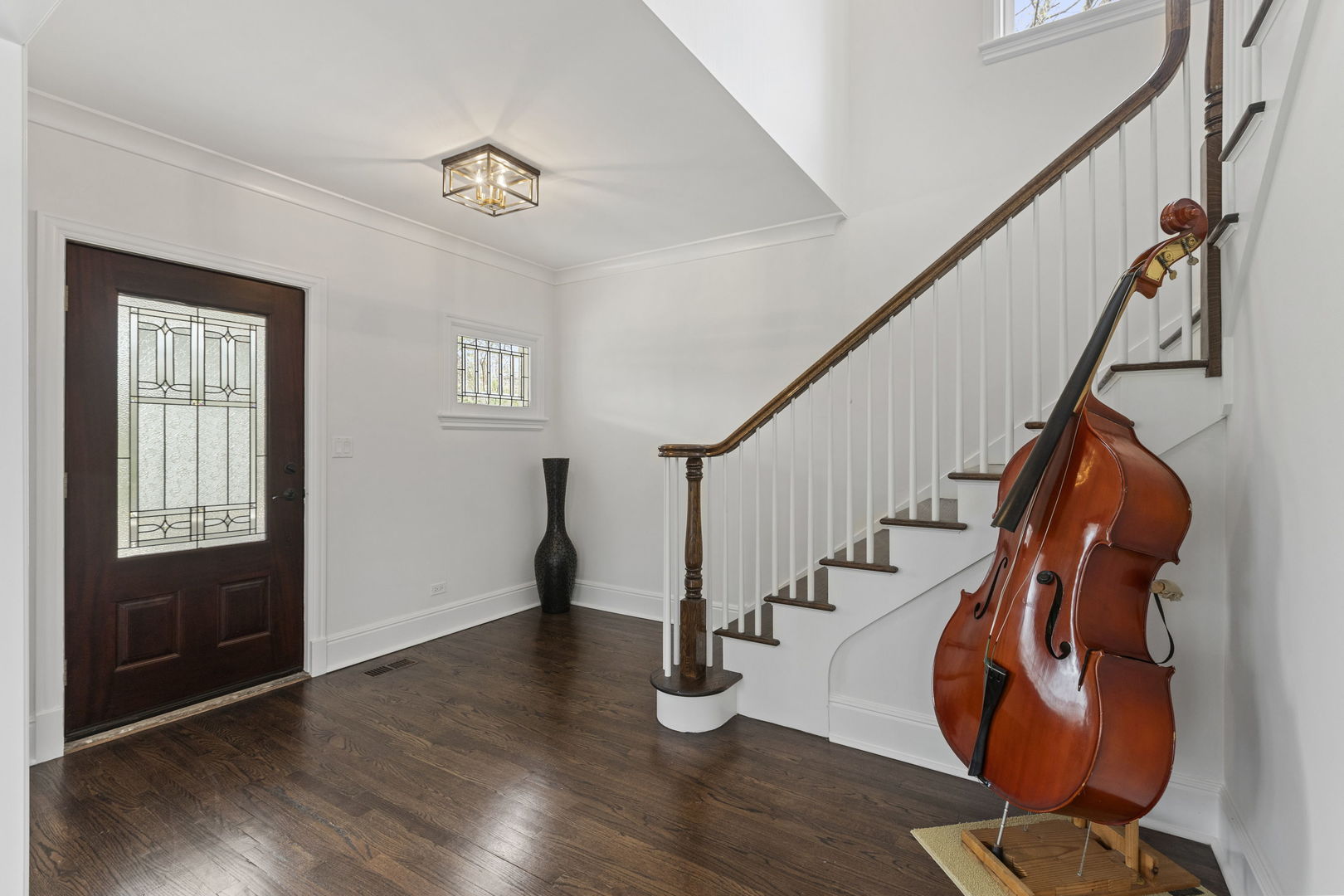 91 Wagner Road Northfield, IL 60093 - Photo 4 of 32 a view of an entryway with wooden floor