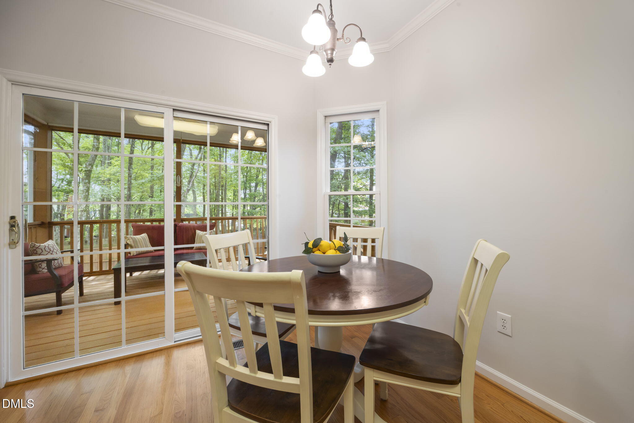 1008 Scotts Ridge Trail Apex, NC 27502 - Photo 21 of 57 a dining room with furniture and wooden floor