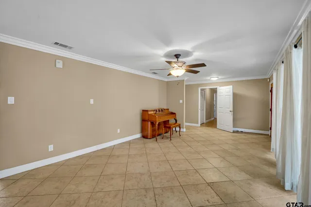 a room that has a table and chair in it