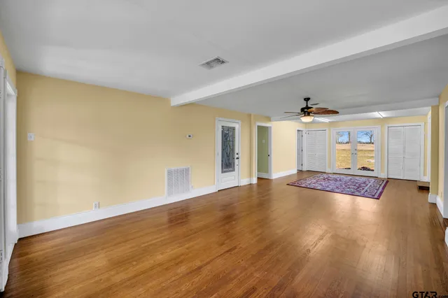 wooden floor with a rug