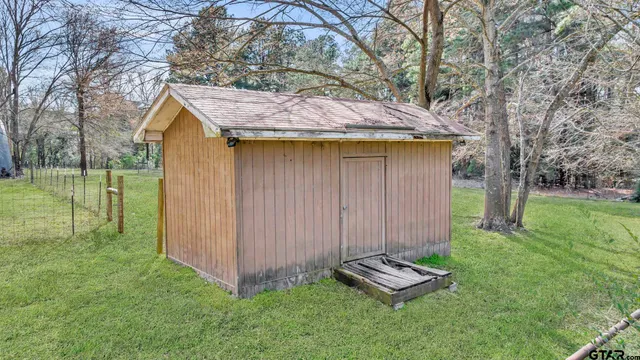 a view of deck and backyard