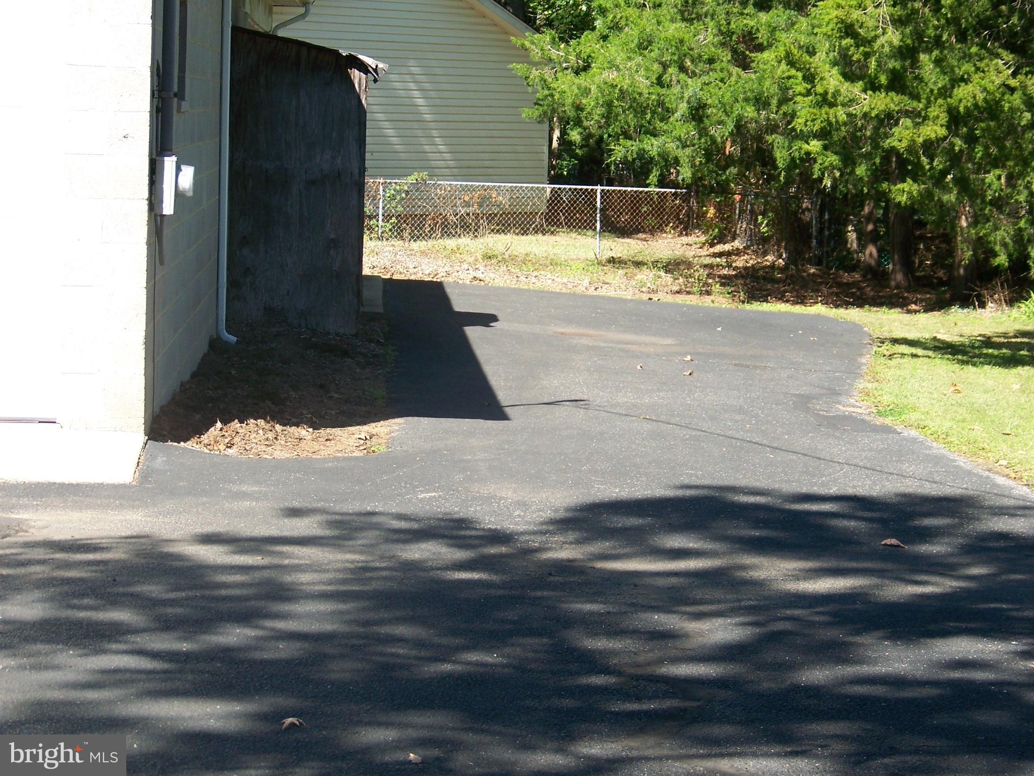 6225 Ripley Road La Plata, MD 20646 - Photo 31 of 41 Pavement down to second garage door