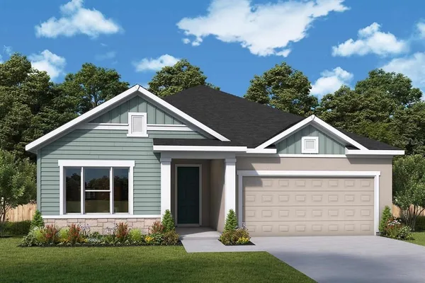 front view of a house with a yard