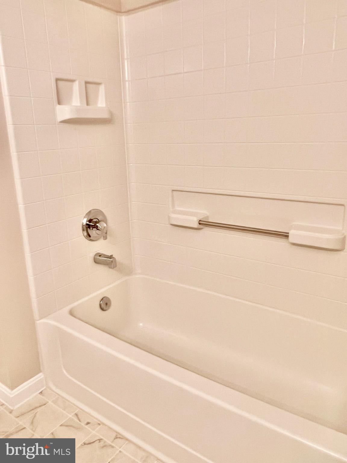 3200 North Leisure World Boulevard, Unit 314 Silver Spring, MD 20906 - Photo 14 of 42 a bathroom with a bathtub
