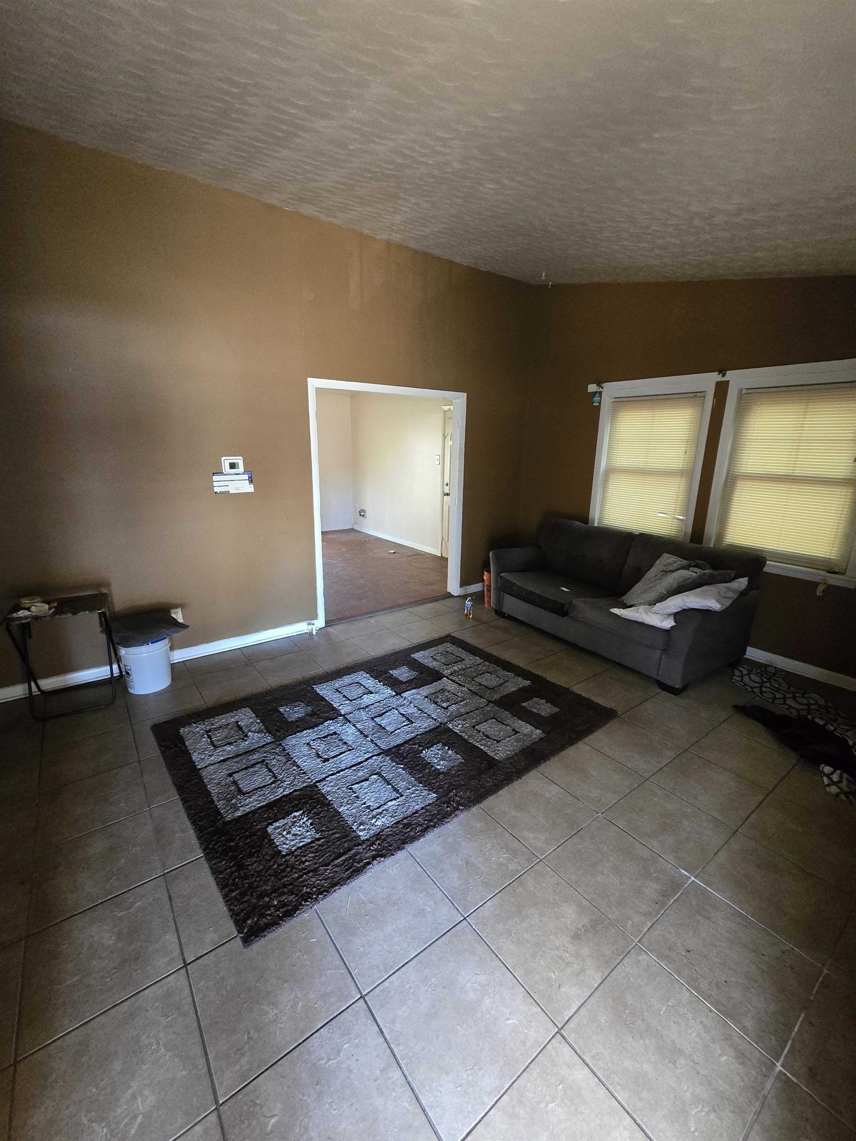 4898 Knight Arnold Road Memphis, TN 38118 - Photo 2 of 10 a living room with furniture