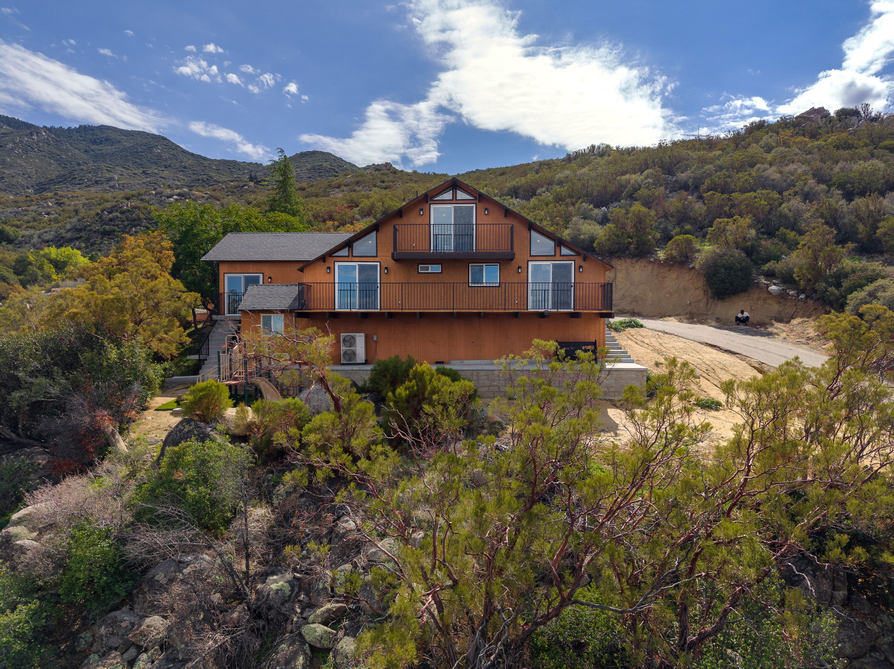 67195 Springcrest Drive Mountain Center, CA 92561 - Photo 15 of 67 a view of a house with a big yard and large tree