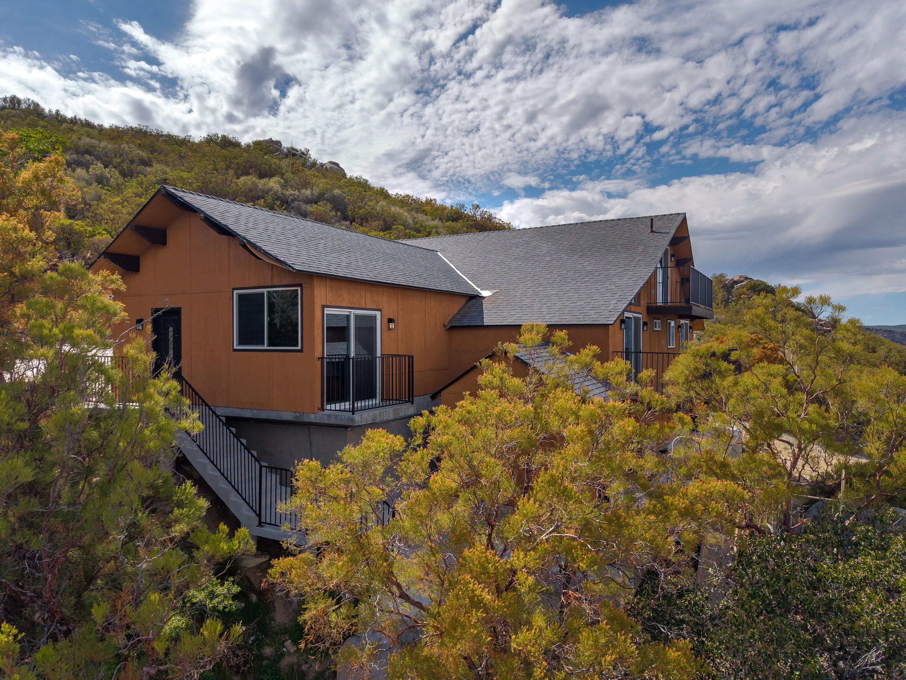 67195 Springcrest Drive Mountain Center, CA 92561 - Photo 18 of 67 a aerial view of a house with a yard and garage