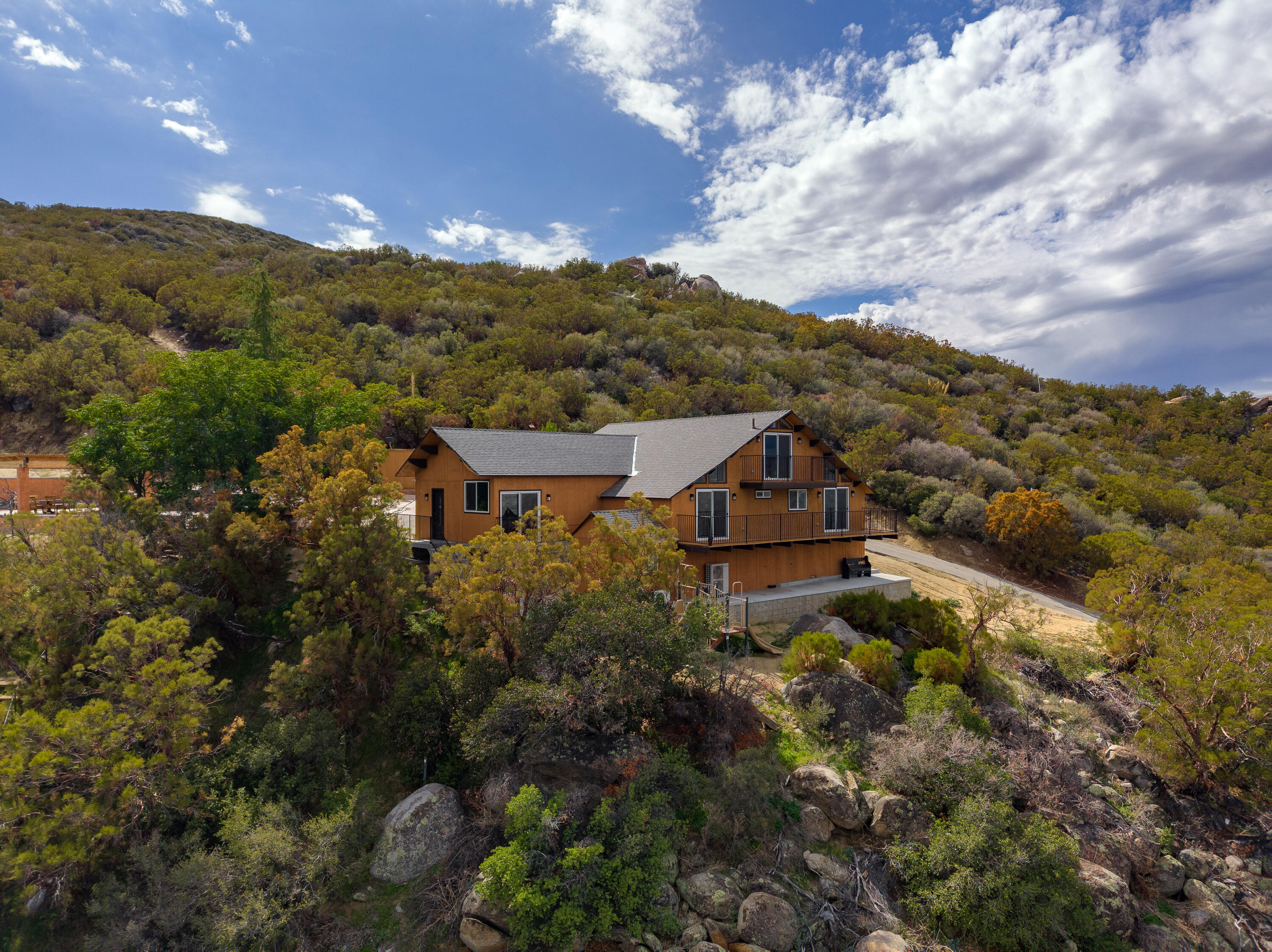 67195 Springcrest Drive Mountain Center, CA 92561 - Photo 2 of 67 a view of a house with a mountain