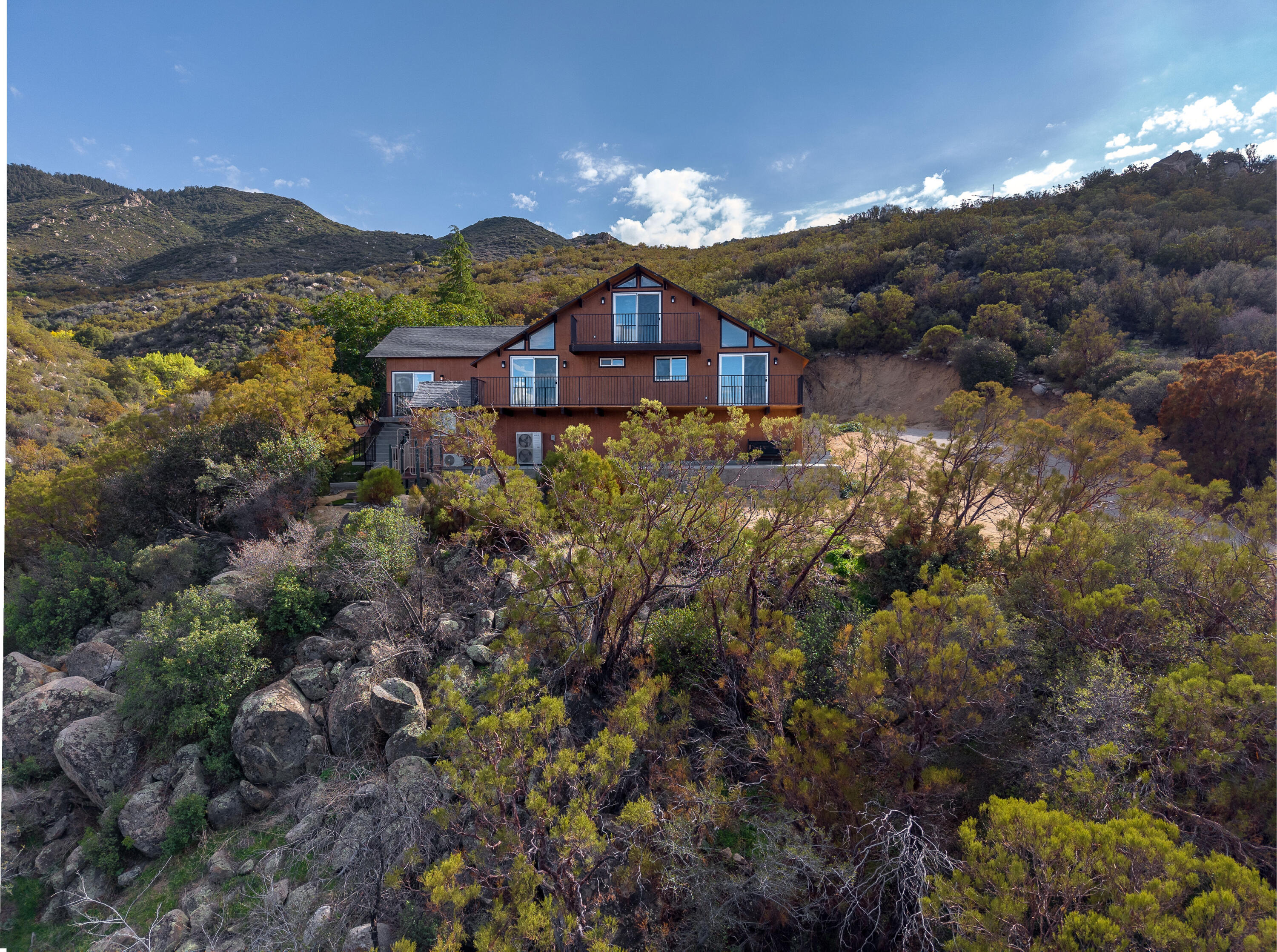 67195 Springcrest Drive Mountain Center, CA 92561 - Photo 26 of 67 a view of a house with a mountain and a forest