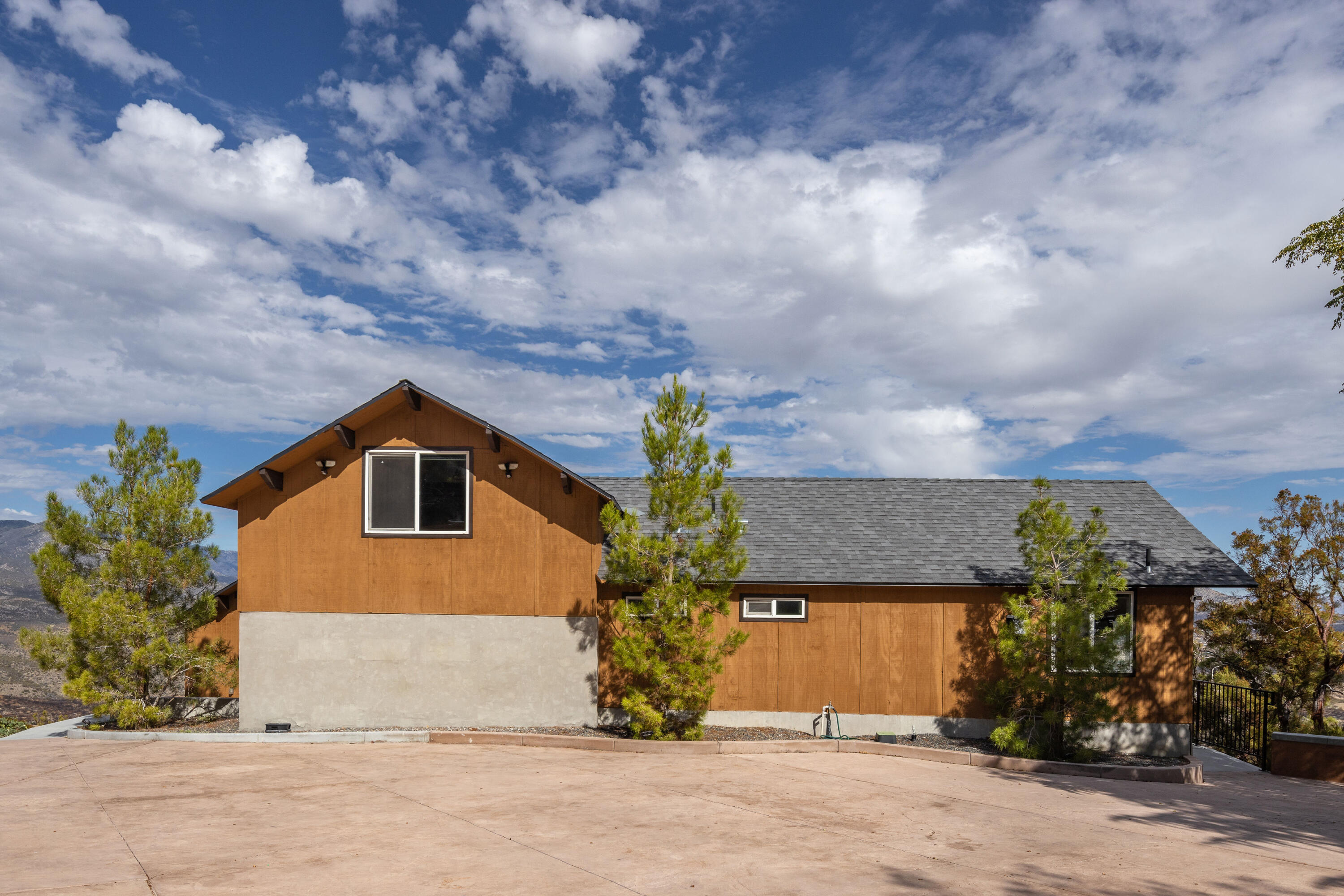 67195 Springcrest Drive Mountain Center, CA 92561 - Photo 29 of 67 a front view of a house with a yard and garage