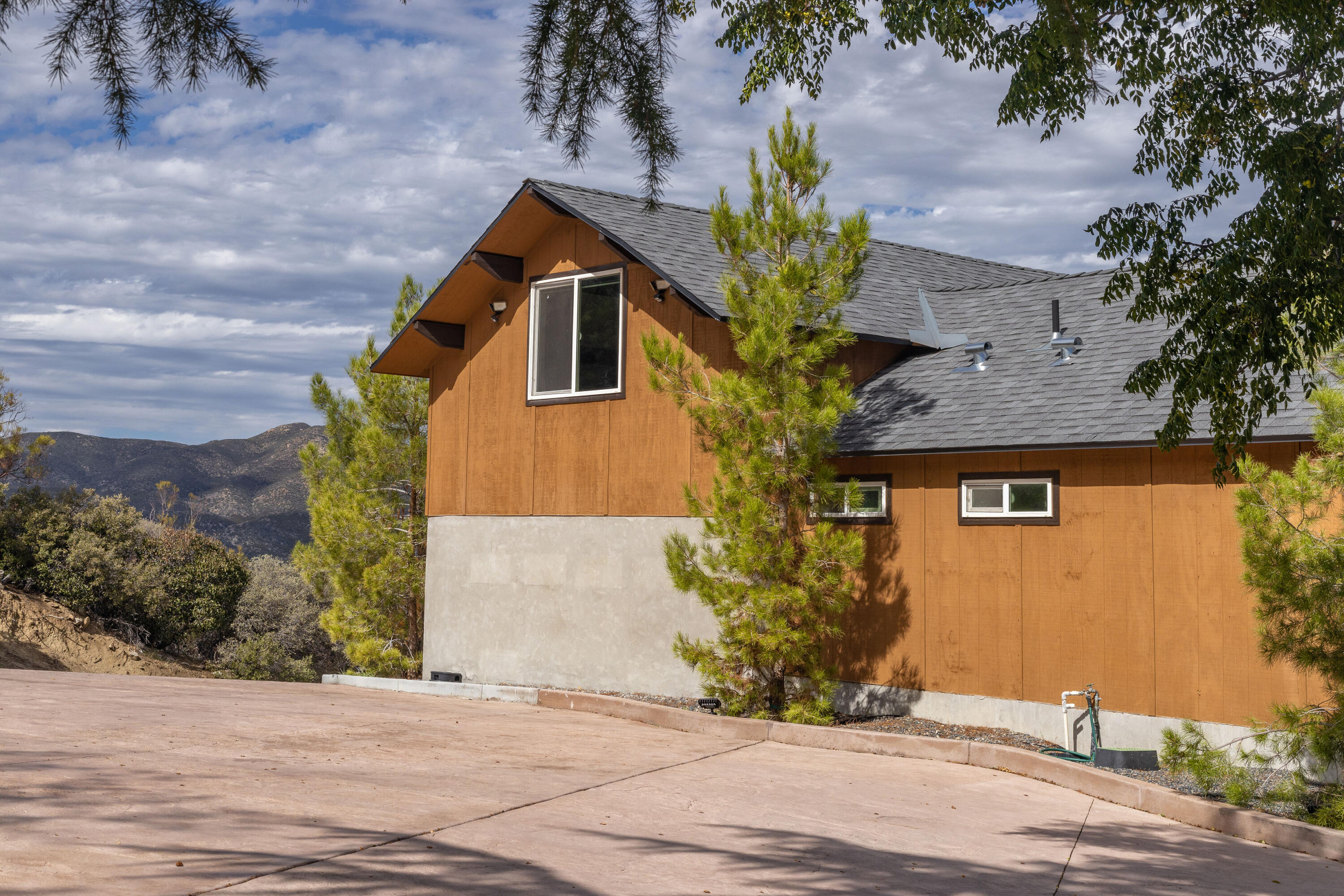 67195 Springcrest Drive Mountain Center, CA 92561 - Photo 32 of 67 a front view of a house with a yard