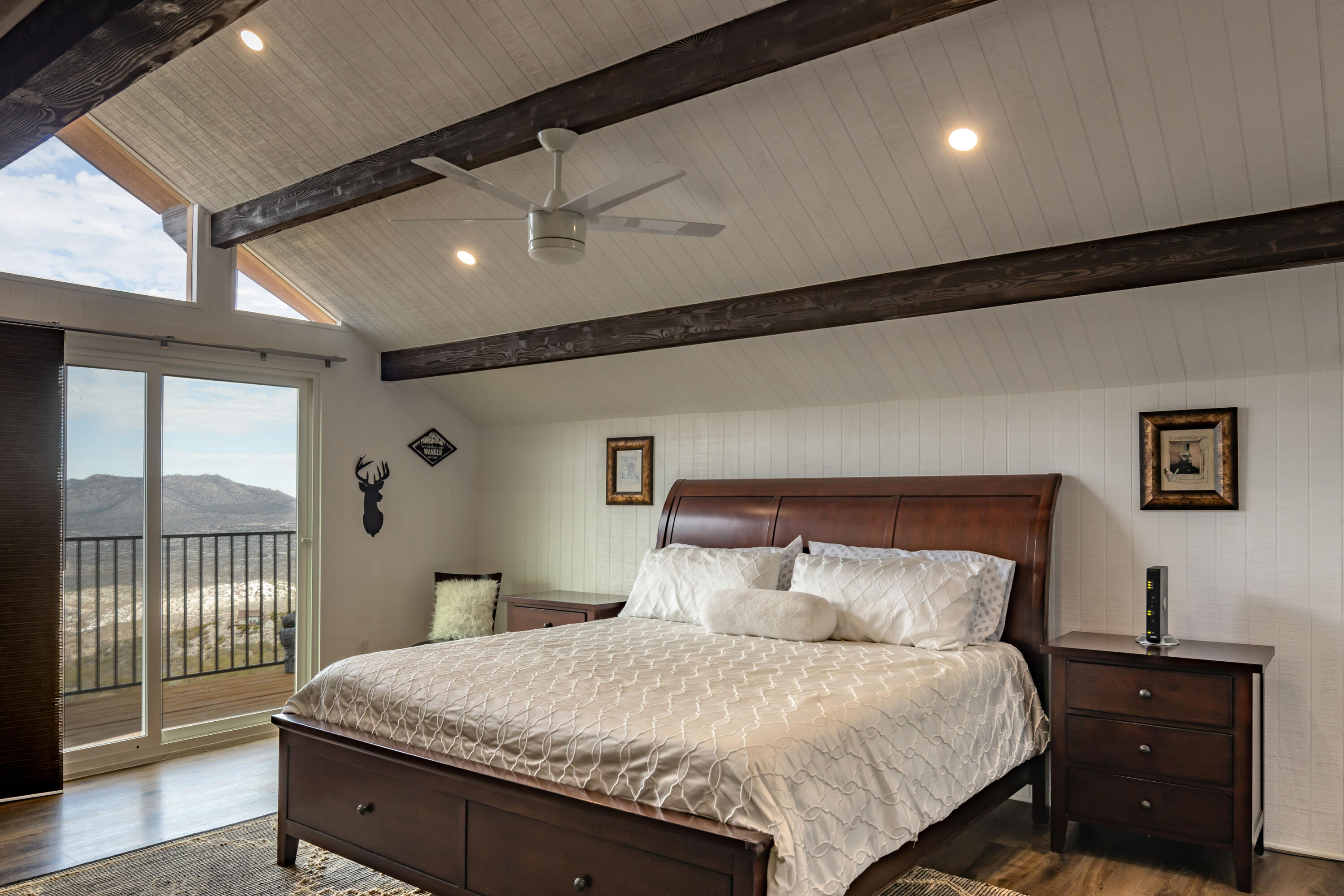 67195 Springcrest Drive Mountain Center, CA 92561 - Photo 49 of 67 a bedroom with a large bed and a tv