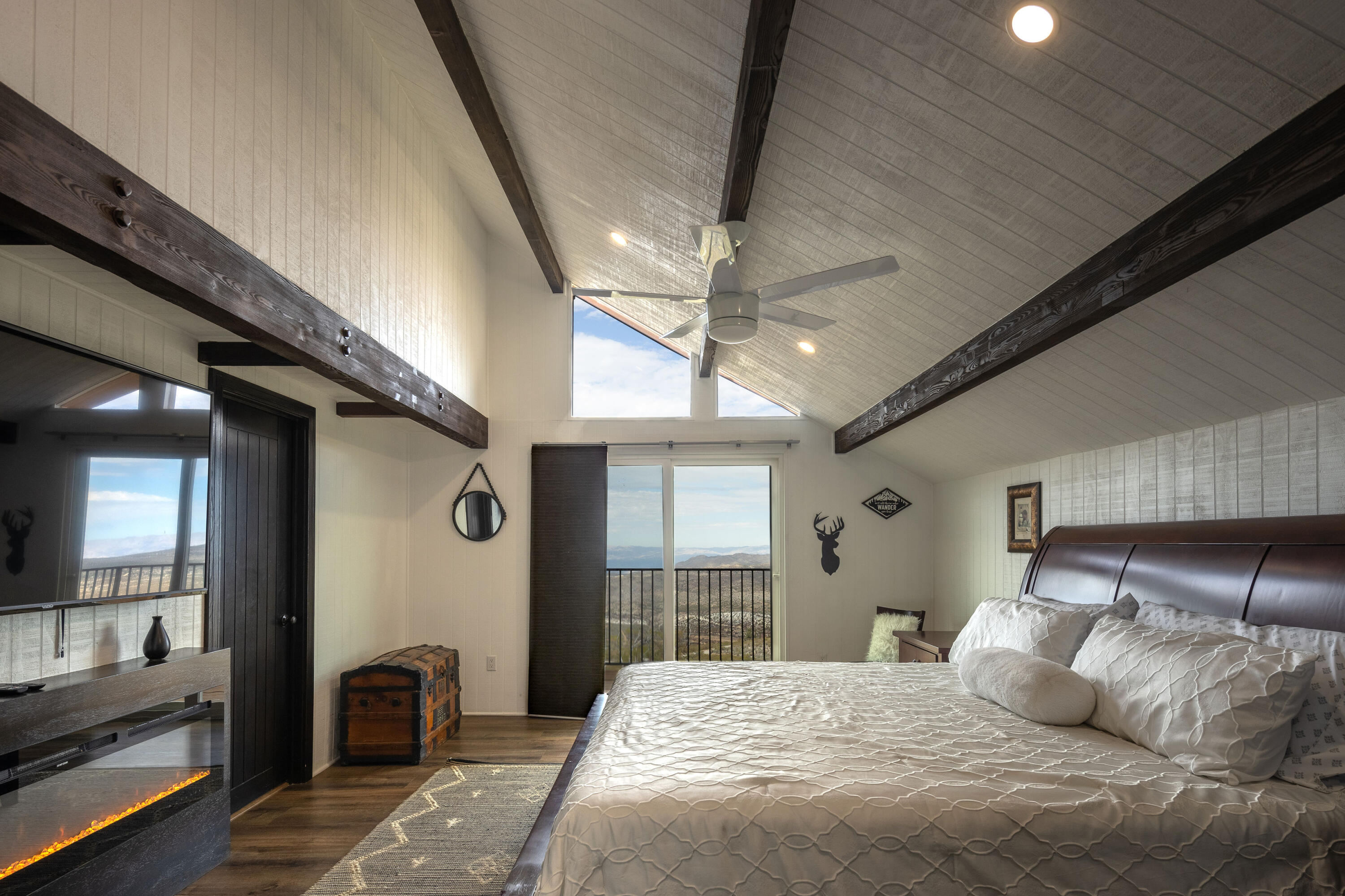 67195 Springcrest Drive Mountain Center, CA 92561 - Photo 50 of 67 a bedroom with a bed and a couch