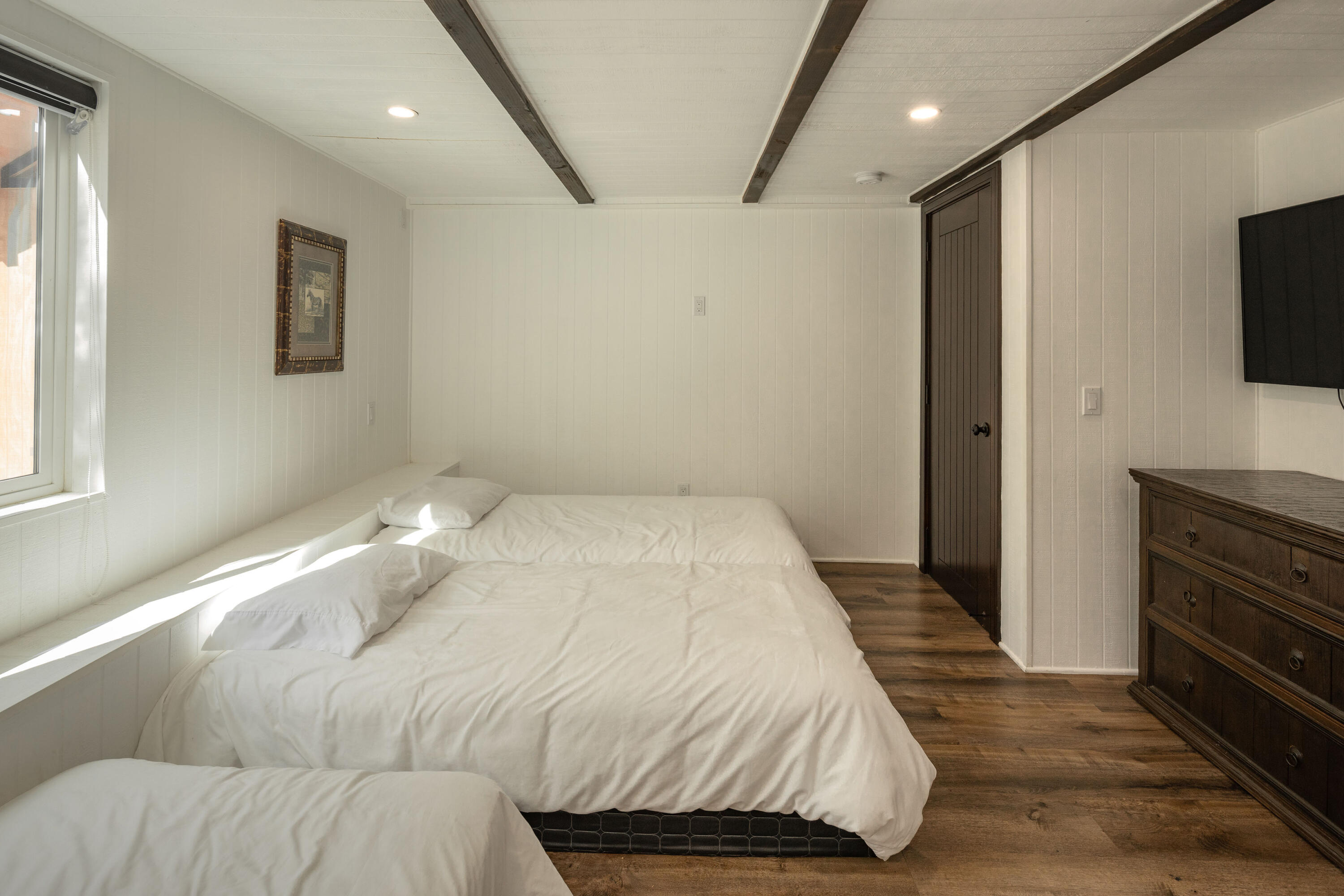 67195 Springcrest Drive Mountain Center, CA 92561 - Photo 54 of 67 a bedroom with a bed and a flat screen tv